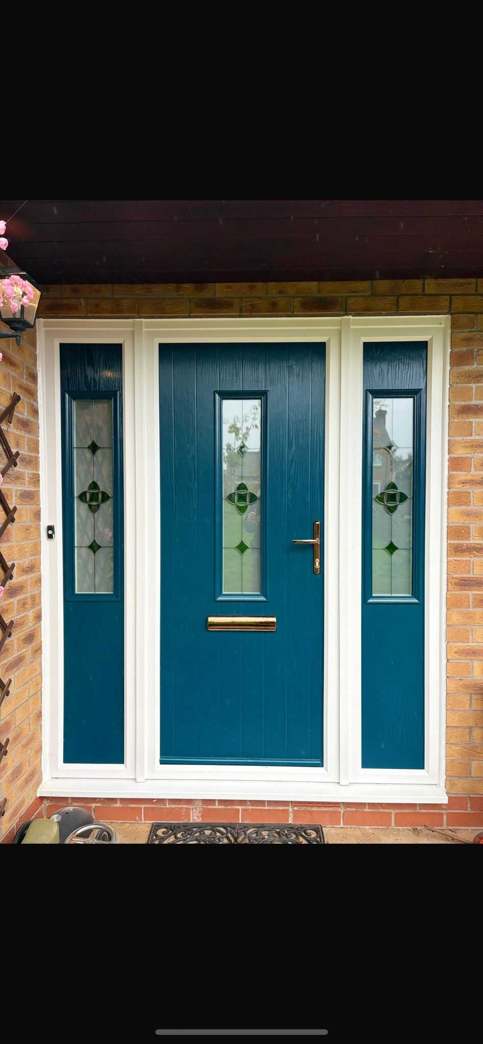 Premium teal composite door with decorative glass sidelights installed in Wantage by CJB Renovations